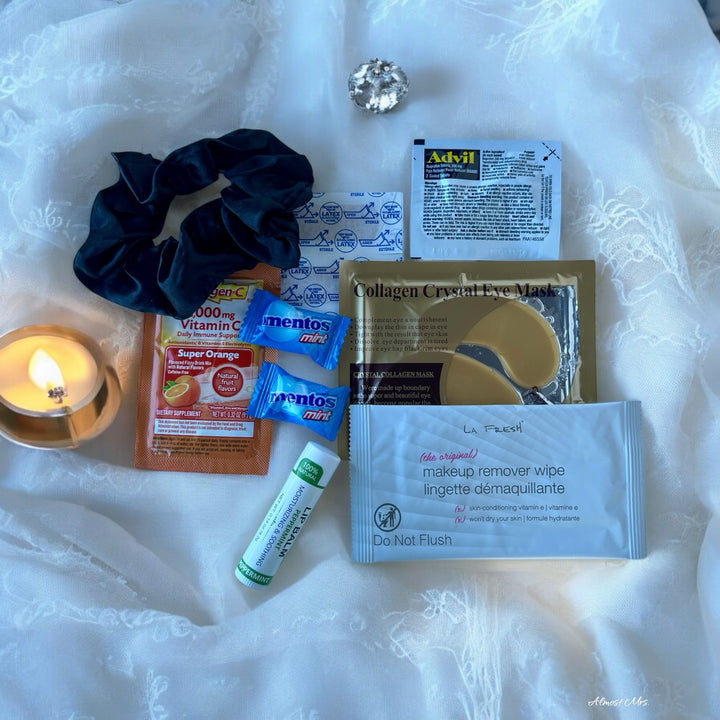 Option B: a soothing makeup wipe, Handy adhesive bandages (x2), Refreshing Mentos mints (x2),Immune-boosting Emergen-C Vitamin C powder packet, Pain-relieving Advil packet, A stylish scrunchie, Rejuvenating collagen eye mask, a nourishing lip balm.